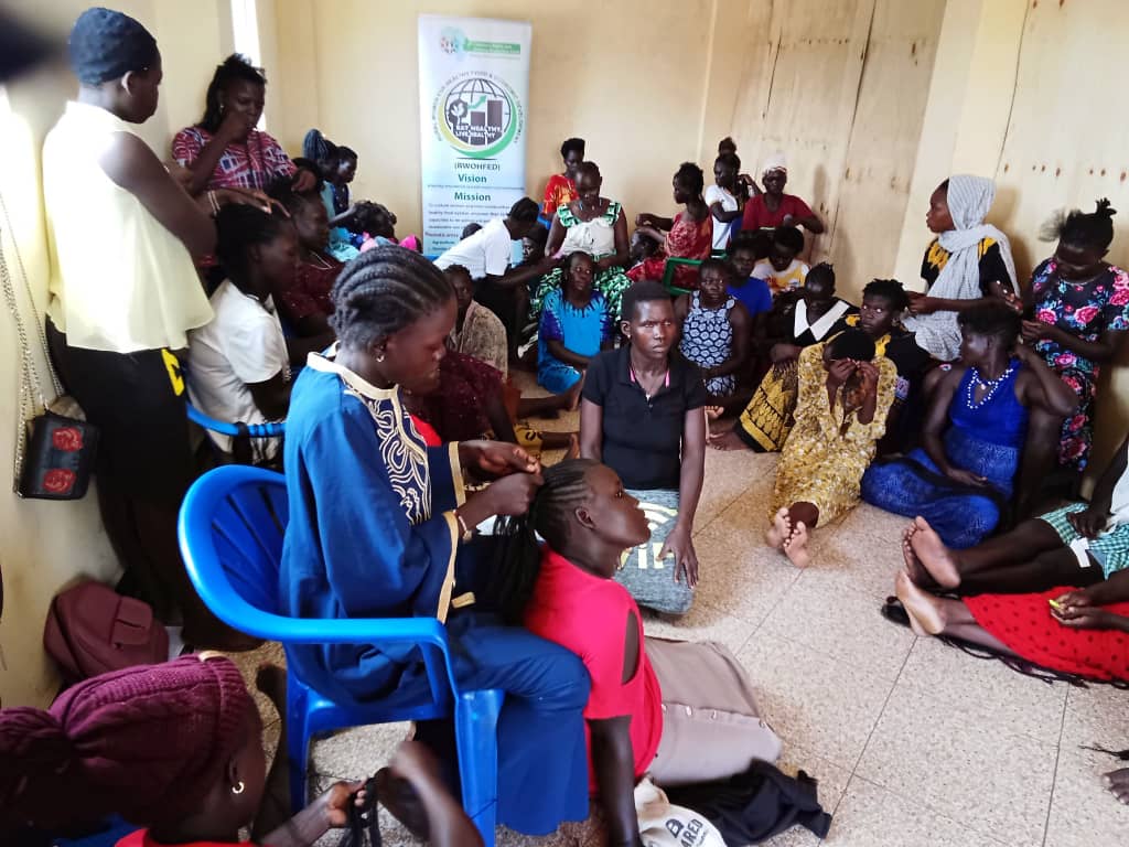 RWOHFED rural women farmers working together in sustainable agriculture program in Adjumani District Uganda